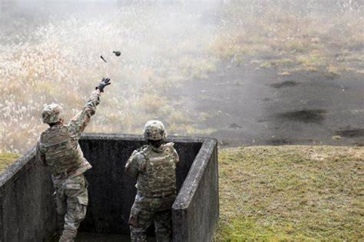 How far can the average soldier throw a grenade?